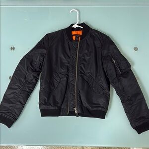 Marc Jacob’s Black Jacket with Orange Interior 
Size Medium 
Used